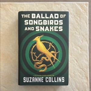 THE BALLAD OF SONGBIRDS AND SNAKES BY SUZANNE COLLINS